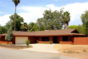 Exterior of single level home in Rancho San Diego, El Cajon