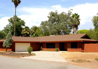 Exterior of single level home in Rancho San Diego, El Cajon